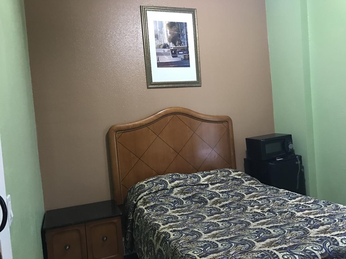 Standard Single Bed Room with Shared Bathroom